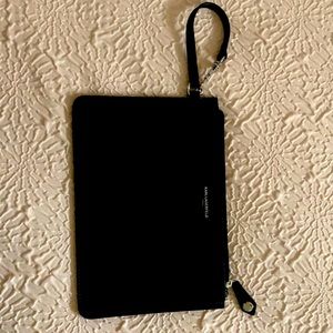 Karl Lagerfeld large black leather wristlet never used